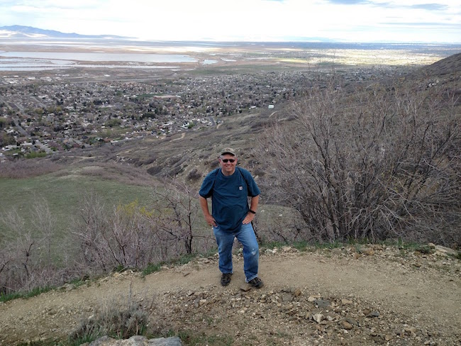 Robert Love in mountains over house