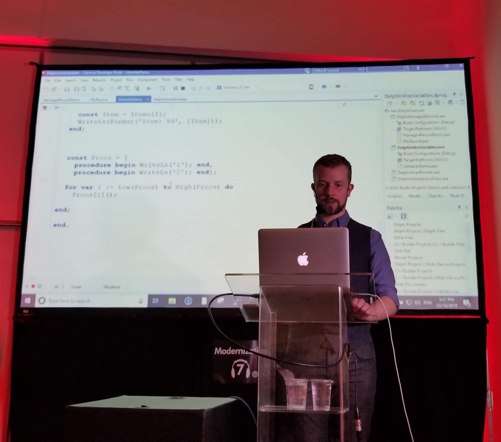 David Millington in front of a screen showing new Delphi language features